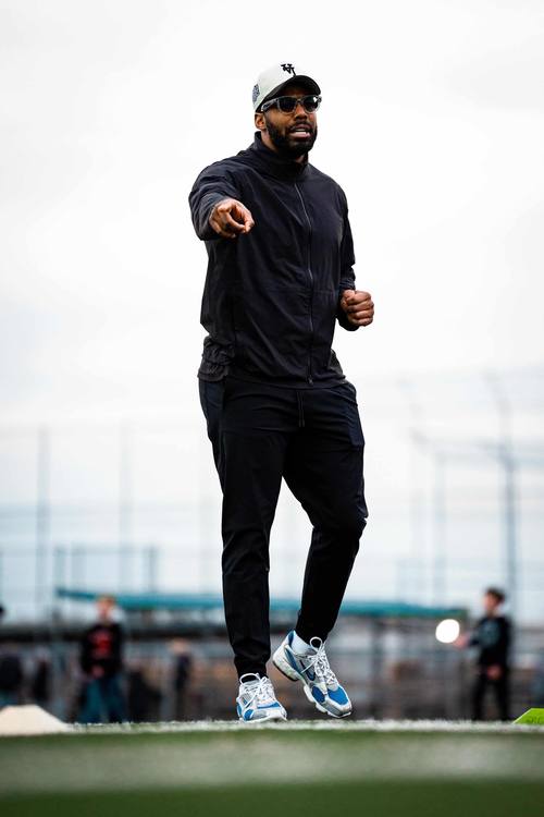 Shamawd Chambers coaching on a football field